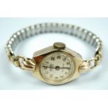 A lady's 9ct gold cased Roamer wristlet watch, with Swiss made 17 jewel movement, a textured
