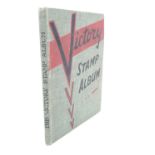 A mid-20th Century Victory stamp album and stamps