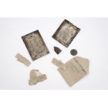A group of archeological artefacts comprising two early Greek tama votive offerings, being