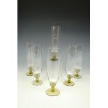 Six Bohemian lager glasses, with yellow daisy-form stems, 22 cm