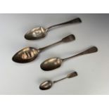 Three Georgian silver table spoons and a tea spoon, 205 g, (a/f)