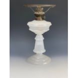 A Victorian milk glass oil lamp