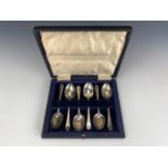 A cased set of silver tea spoons bearing engraved initial G