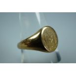 A 9 ct gold signet ring, its oval face bearing an engraved monogram, N, 3.7 g