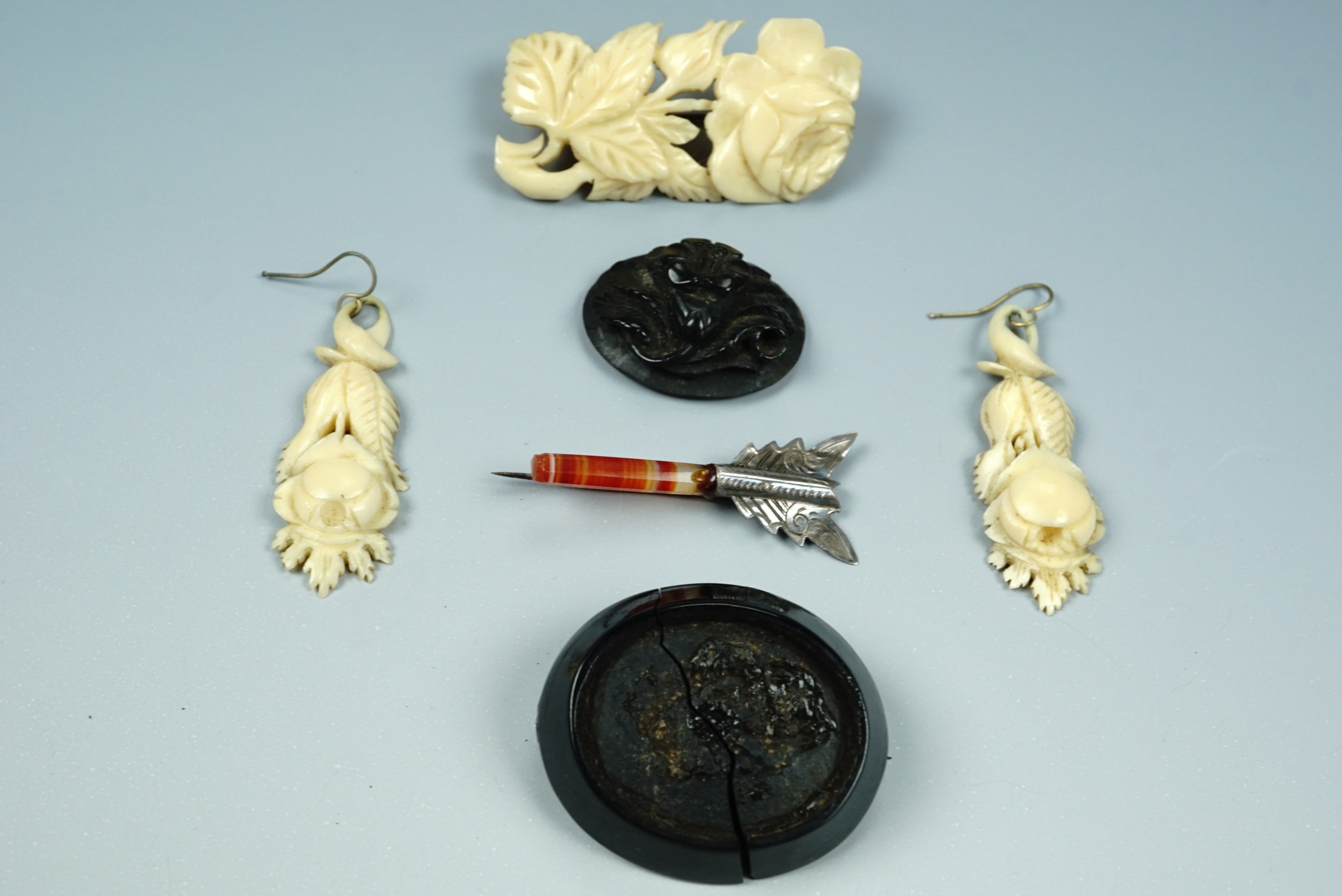 Victorian jewellery, including a jet brooch, ivory ear pendants and a brooch, together with a