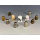 Two Charles Horner Dorcas thimbles and others.