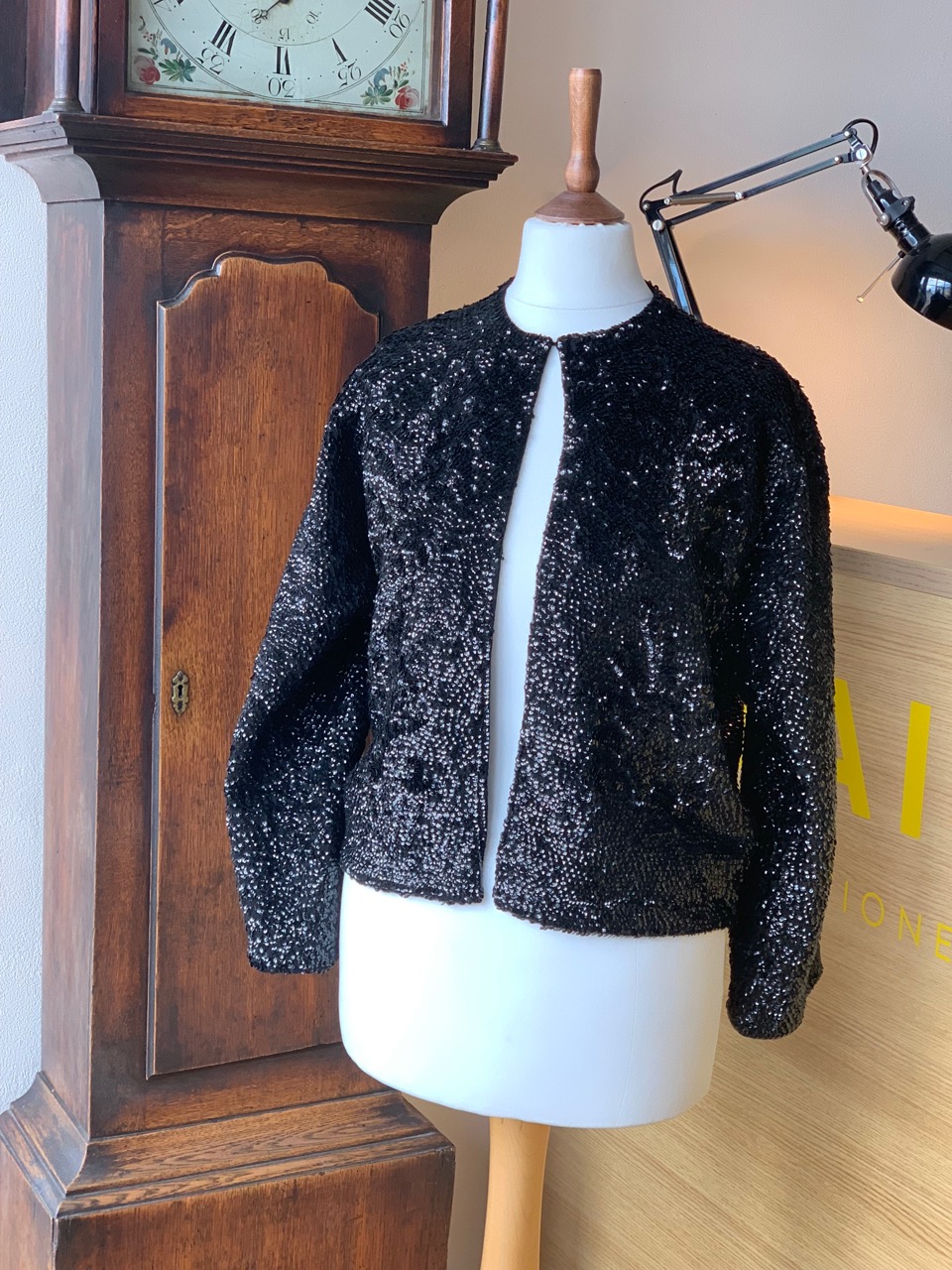 A late 1950s Arts Knitting of Hong Kong "Lovely" brand knitted sequin jacket, incorporating a subtle