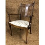 A Victorian marquetry inlaid rosewood bedroom / salon armchair