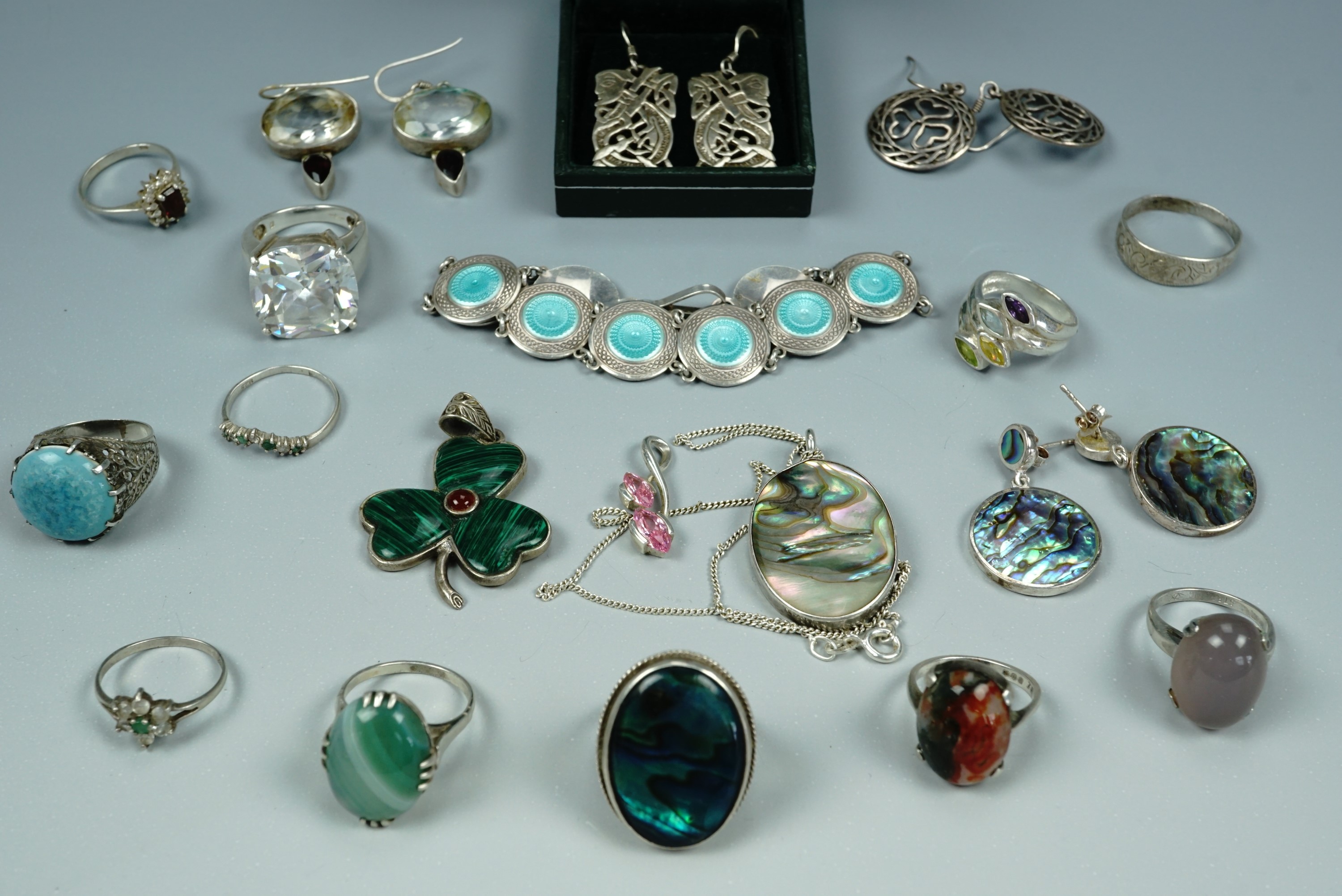 A quantity of vintage and contemporary silver and white metal jewellery including a pale blue bass