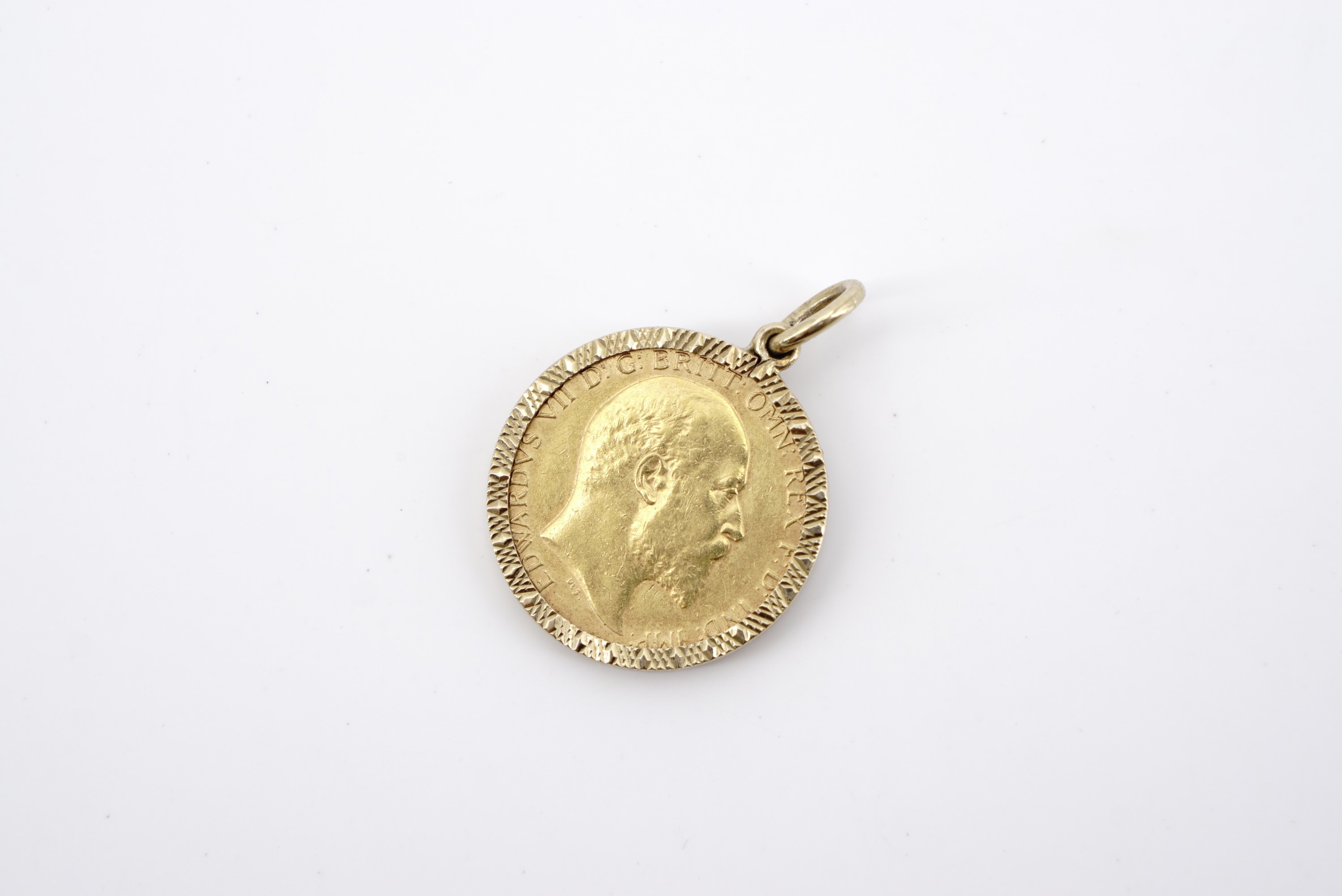 A 1902 gold half Sovereign in 9 ct gold pendant mount