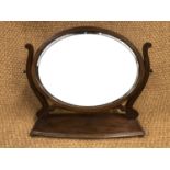An early 20th Century reproduction Hepplewhite style mahogany swivel toilet mirror, 58 cm x 55 cm