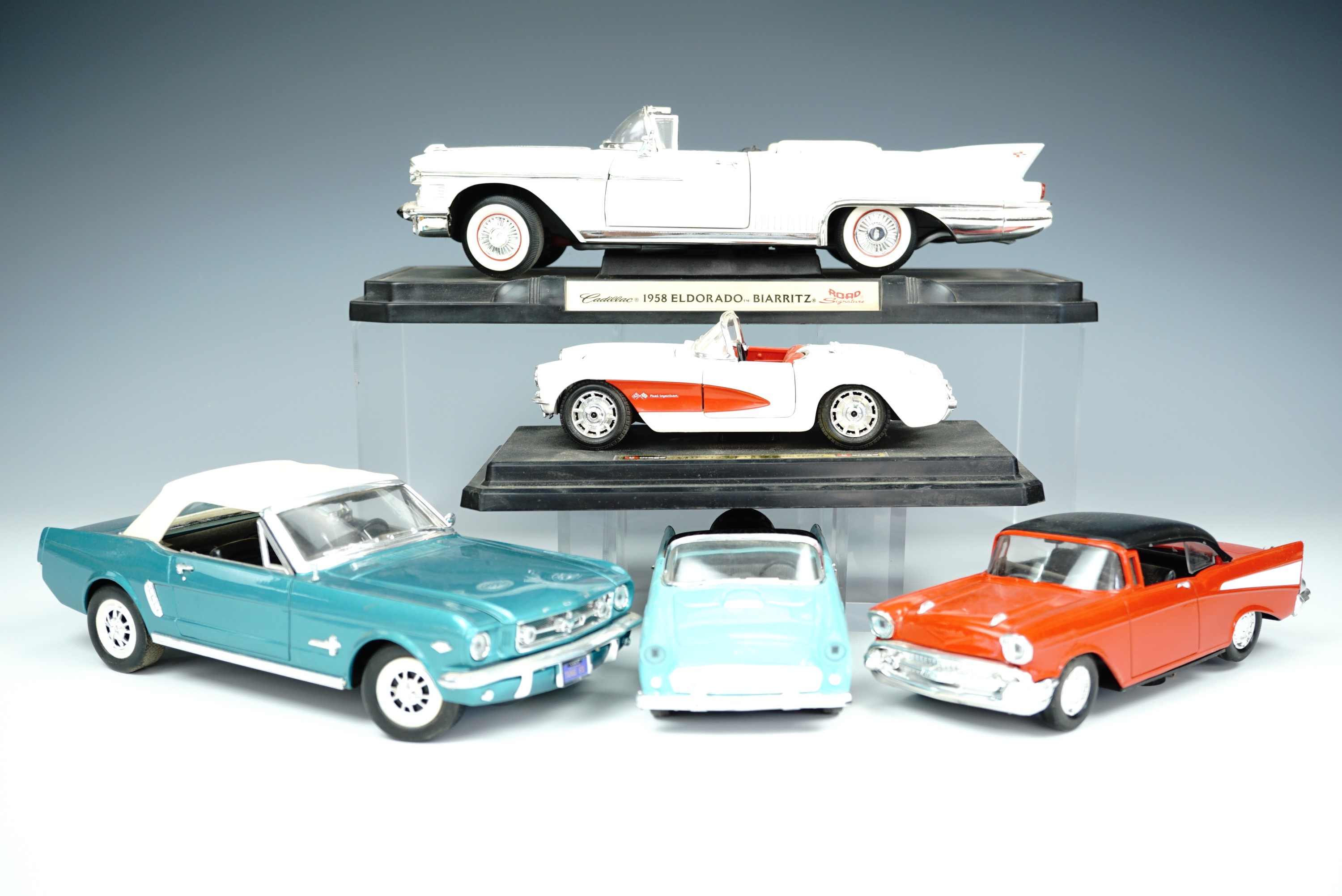 A collection of Mira and other die-cast toy American cars.