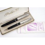 A cased Parker "51" pen set, comprising fountain and ball point pens, with instructions