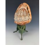A cameo-engraved conch shell table lamp, second quarter 20th Century, 20 cm