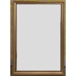 A large contemporary gilt-framed wall mirror, 100 cm x 70 cm