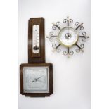 An oak wheel barometer together with another by Short Brothers