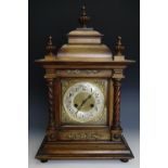 A late 19th Century Hamburg American Clock Company walnut mantle clock, 53 cm
