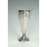 An early 20th Century Modernist silver vase, of elongated and inverted pyramidal form with angular