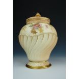 A Royal Worcester blush ivory pot pourri vase and covers, of fluted and shouldered form, the