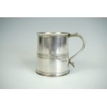 An Elizabeth II silver cup, of subtly tapering form, with scroll handle and banded decoration,