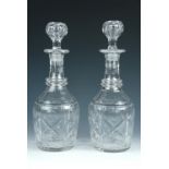A pair of Victorian cut glass decanters, 30 cm