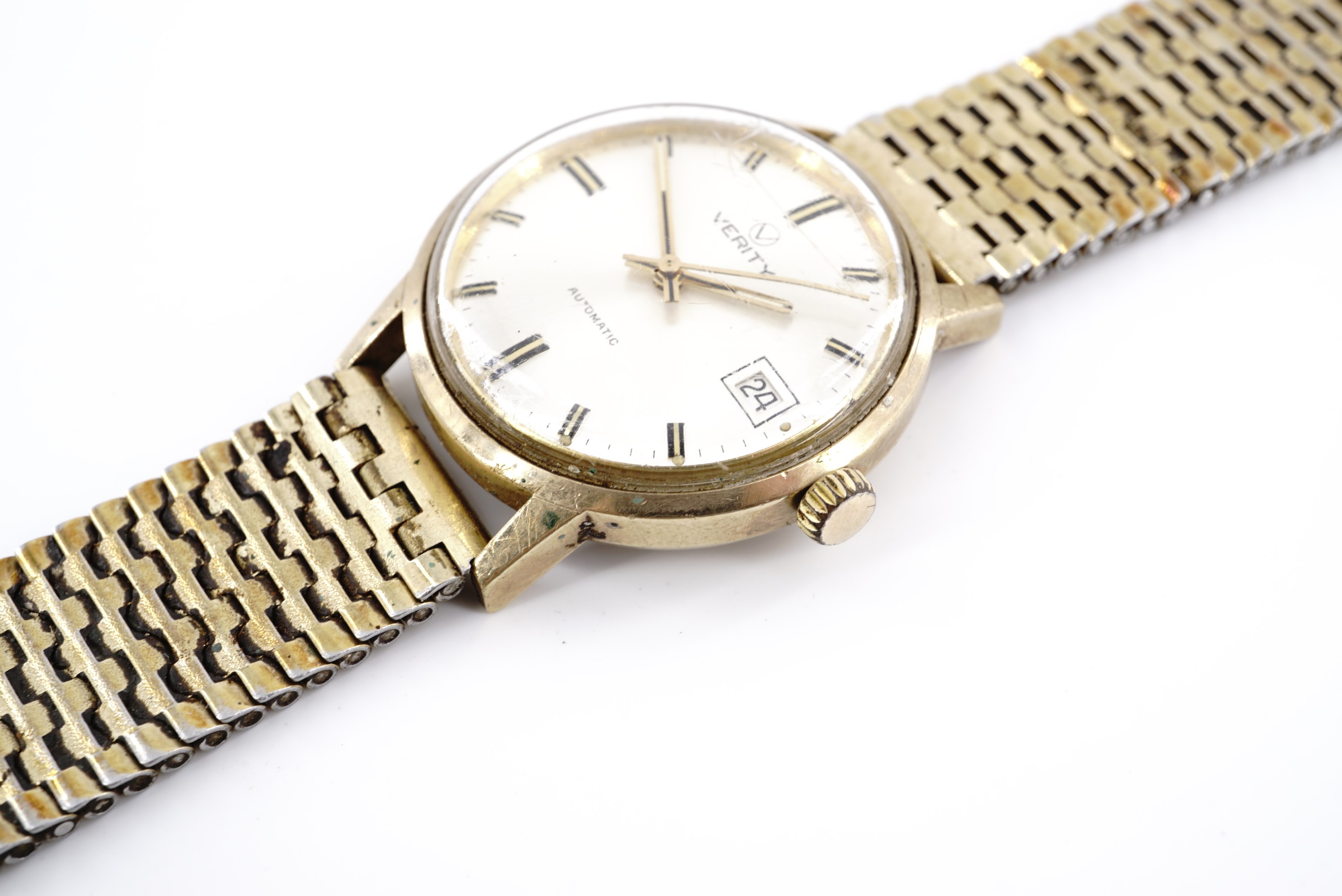 A 1970s Verity 9 ct gold wristwatch, having an automatic movement and radially brushed silver face - Image 2 of 4