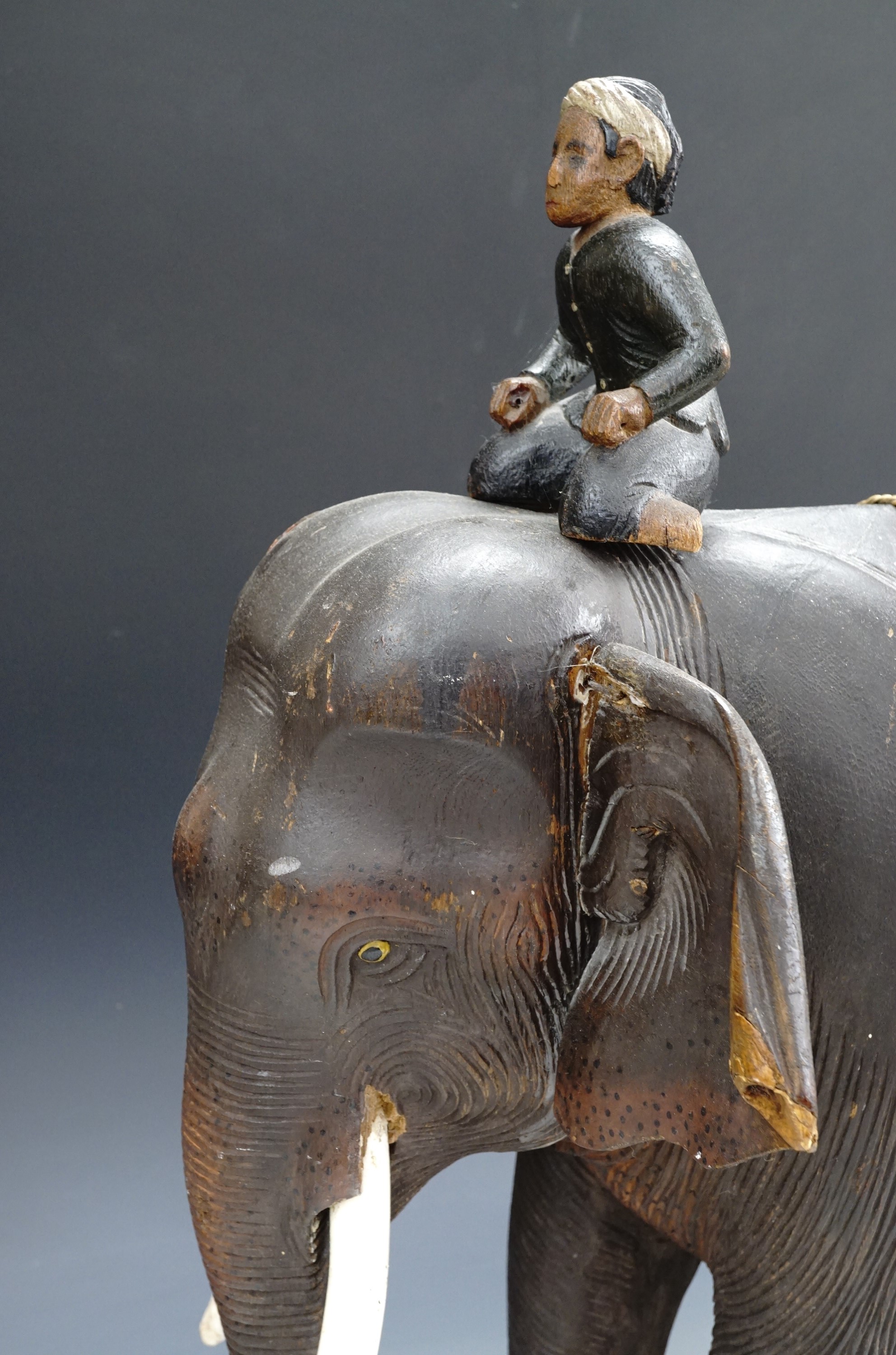 A 1930s Malayan elephant sculpture of carved wood, depicting a naturalistically modelled elephant - Image 3 of 8