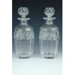A pair of late Georgian / early Victorian cut glass spirit decanters, 19 cm