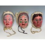 Three inter-War fancy dress papier-mache masks, possibly the Three Witches from Shakespeare's play