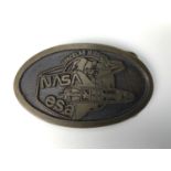 A NASA / European Space Agency Spacelab Mission commemorative brass belt buckle