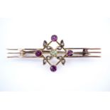 An early 20th Century Scottish suffragette acrostic brooch, comprising a diamond arrangement of