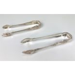 Two pairs of Victorian Provincial Scottish silver sugar tongs, King's and Queen's pattern, Robert