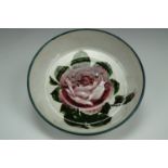 A late 19th Century Wemyss dish, circular section, the decoration depicting a cabbage rose, 13 cm,