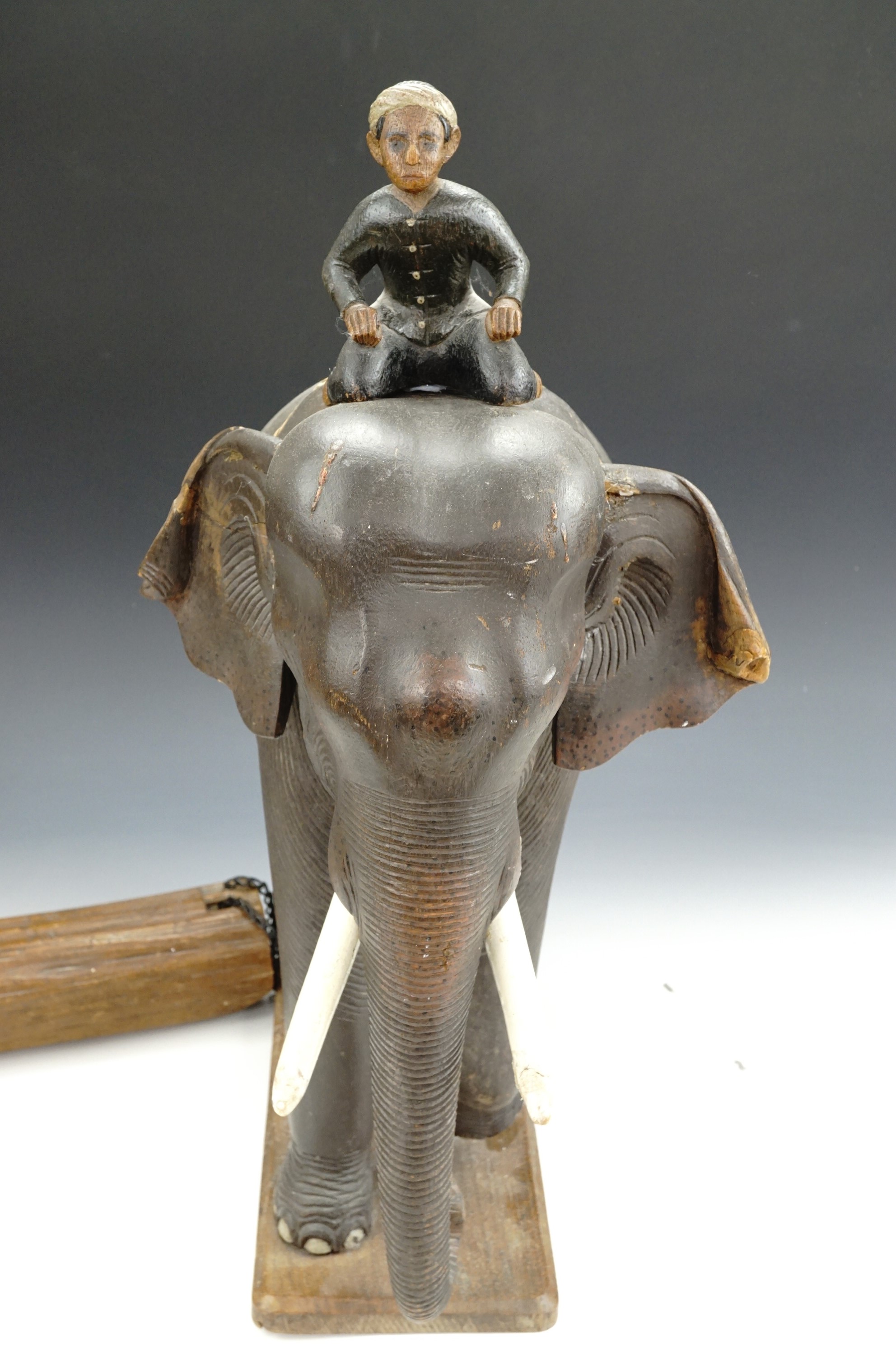 A 1930s Malayan elephant sculpture of carved wood, depicting a naturalistically modelled elephant - Image 7 of 8