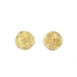Two Indian yellow metal fanam or similar coins, (tested as high carat gold), approx 15 mm,6.9 g