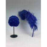 A 1930s indigo blue ostrich feather plume with celluloid handle, and a matching Manning of London