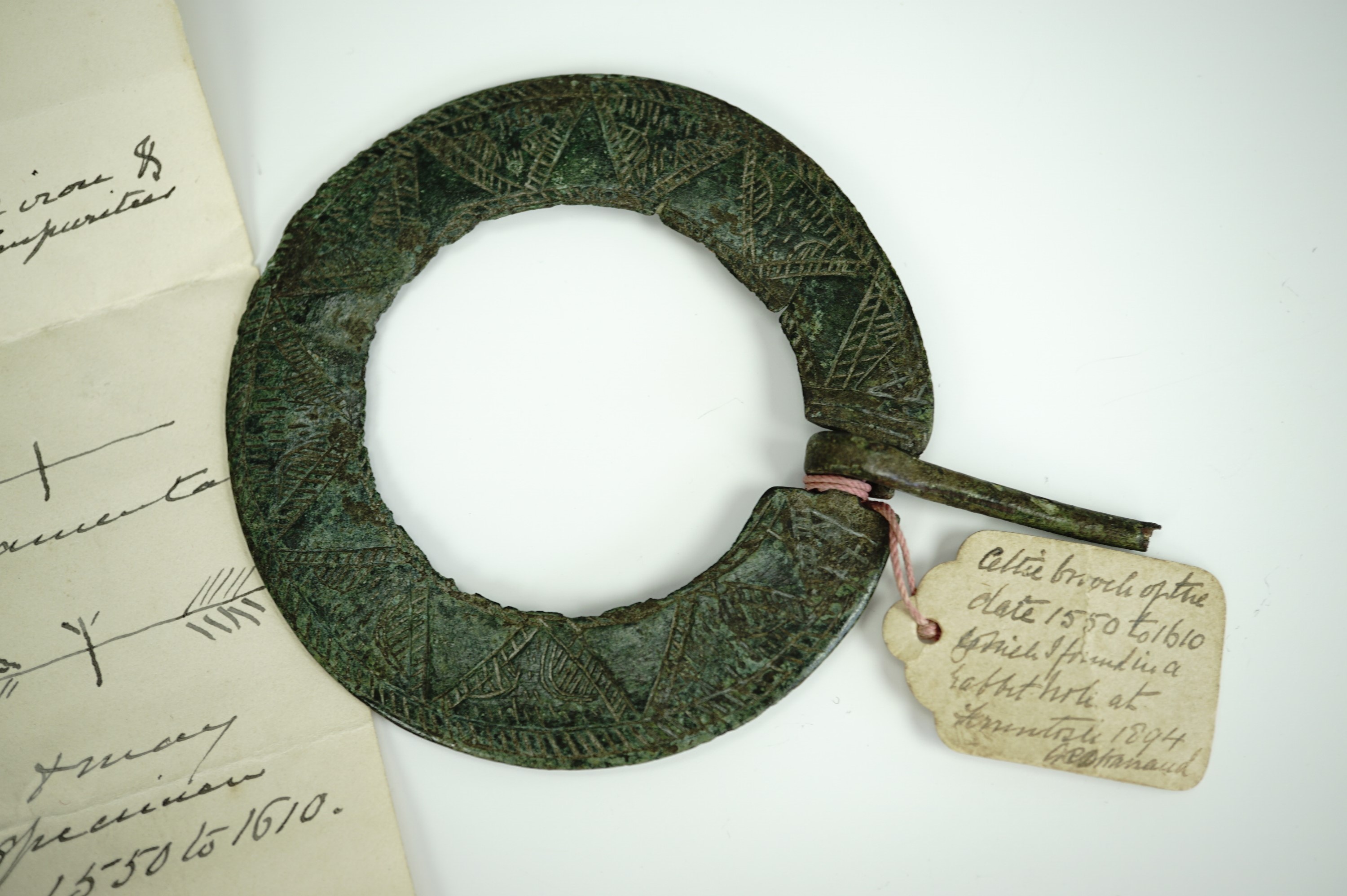 A Scottish latten pseudo-penannular brooch, of planar form, simply decorated in a pattern of - Image 2 of 3