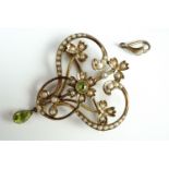 A Belle Epoque yellow-metal, peridot and pearl pendant brooch, in an openwork whiplash design