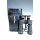 A set of German Third Reich cased Kriegsmarine 7 x 50 binoculars, the case dated 1943