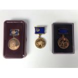 Three Russian space exploration commemorative medals