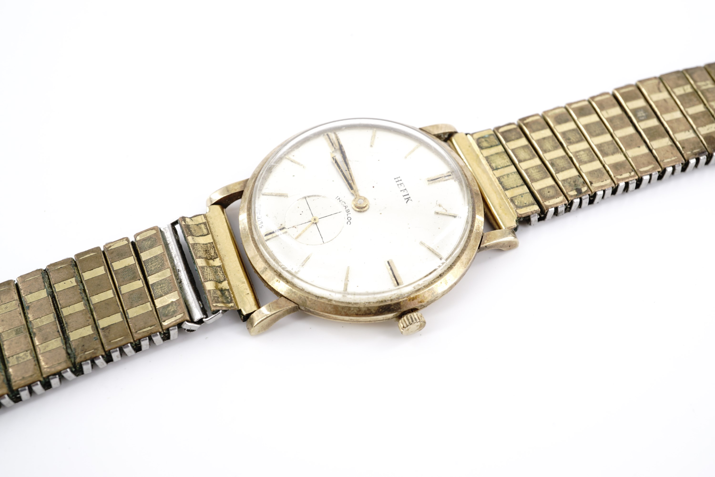 A 1960s Hefik 9 ct gold wristwatch, having a Swiss 17 jewel manual wing movement and radially - Image 2 of 2