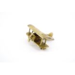 A finely executed "trench art" brooch modelled as a Great War Royal Flying Corps or RAF bi-plane,