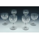 A set of six Victorian cut glass wine goblets, 15 cm