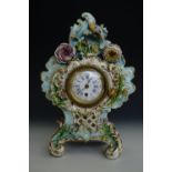 A late 19th Century Sevres style Rococo influenced porcelain clock, 29 cm