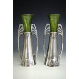 A pair of early 20th Century WMF Secessionist electroplate and cut green glass vases, 19 cm, (one