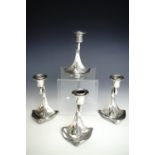 A set of four early 20th Century WMF electroplate candlesticks, 14 cm