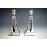 A pair of early 20th Century WMF Secessionist electroplate candlesticks, 15 cm