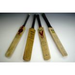 Four miniature cricket bats, one bearing facsimile 1956 Australian touring team signatures, the