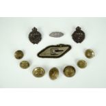 A group of Great War Tank Corps insignia including a 1917 silver brooch by the Goldsmiths' and