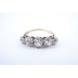 A five stone diamond ring, the central stone of approx 0.6 ct, total diamond weight approx 2.1 ct,